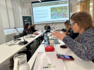 A group of people sitting at a table
AI-generated content may be incorrect.